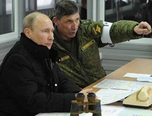 Путин завершил военные учения и отправил войска в казармы