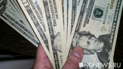 Спрос на доллары за год вырос более чем на треть